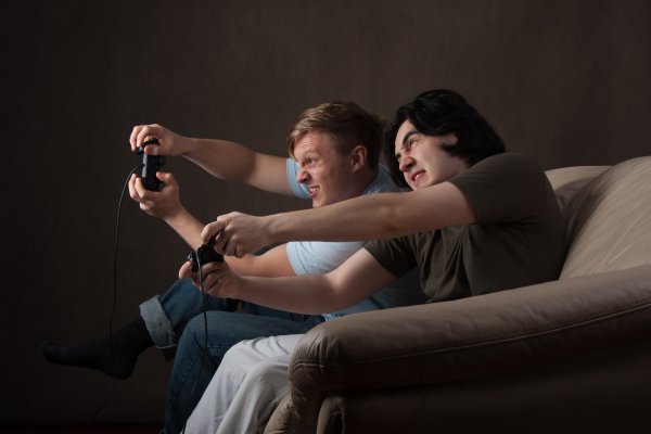 guys men playing video games playstation vpn services